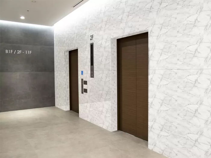 DDG JAPAN/セラミックプリントガラス/大理石調(エレベーターホール)