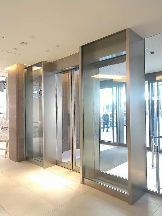 両袖FIX付両引自動框ドア / 株式会社マルサ佐藤製作所